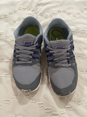 Nike Gray Sneakers with Purple Accents and Green Insole